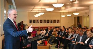 PM celebrates caucus unity, but does have a cost