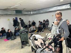 ‘We meet again’: Inside the ‘pajama party’ at a north Tel Aviv bomb shelter