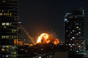 Woman killed, dozens injured as Iranian missile strikes Tel Aviv residential block