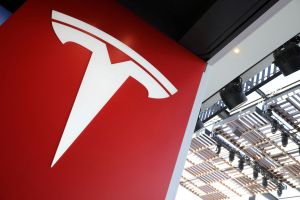 Tesla Stock Closes Near $403 Amid Geopolitical Pressures and Autonomy Focus