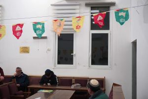 After deadly missile impact, Beit Shemesh struggles to maintain Purim cheer