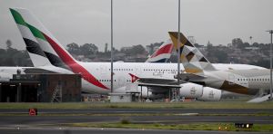 Commercial flights will be your best way out of Middle East, Wong tells stranded Australians