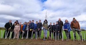 Eco-friendly scouts help farmer plant hedging as part of 'million trees' project