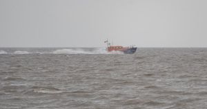 How do you deliver a baby without a midwife or a doctor on a Scottish island?