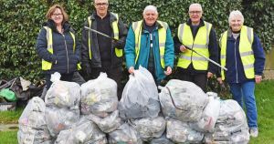 Two sofas and rubbish among waste dumped across village