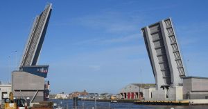 Busy bridge closed after lorry hits cyclist