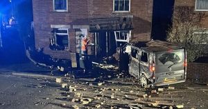 Night of carnage on village road sees five homes damaged and driver arrested