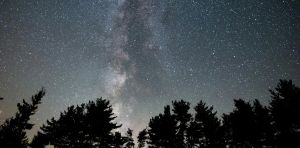 Deep underground, a telescope may soon detect ghosts of stars that died before Earth existed