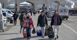 Iranians crossing into Turkey haunted by regime crackdown more than war