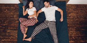 ‘Sleep divorce’: could separate beds improve your health?
