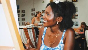 A Wisconsin senior painted 44 portraits of classmates she’d drifted from. Their reactions when they received them say everything.