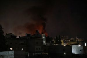 10 reported injured as settlers torch cars, property in West Bank Palestinian town