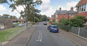 Woman charged after cash stolen from home