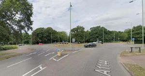 Biker seriously injured in crash with Jaguar at roundabout