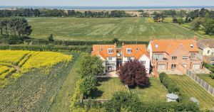 Cottage with coastal views hits the market