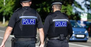 Victim hands over credit cards and phone after being targeted in police scam