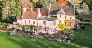 Manor home with private tennis court and Victorian swimming pond hits market