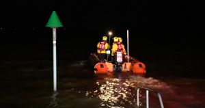 Five people stranded after being cut off by tide at harbour