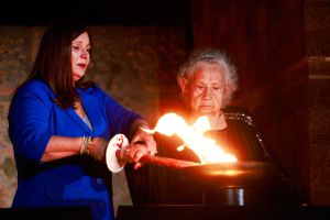 Amid echoes of war, these survivors will light Yom Hashoah torches in pre-recorded ceremony