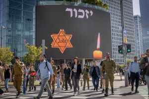 With memorial siren wailing, Israel remembers Holocaust victims in shadow of war tensions