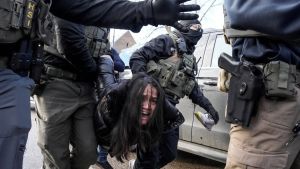 Minneapolis Woman Violently Dragged From Car by ICE Files Claim Against DHS