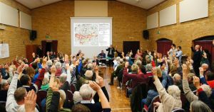 Worried villagers pack public meeting to oppose massive solar farm
