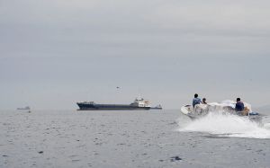 Iran reimposes Hormuz closure after US maintains blockade; IRGC gunboats fire at ships