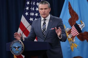 Kriege und das Völkerrecht: Was Friedrich Merz und Pete Hegseth gemeinsam haben