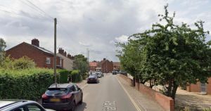 Road blocked after crash between motorbike and car