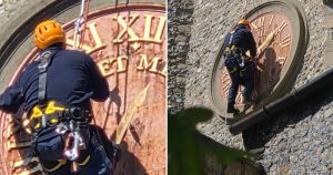 Engineer abseils down 15th-century church to restore its clock