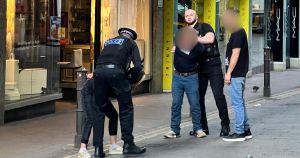 Police officer attacked in broad daylight outside department store