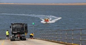 Man rescued from water after boat overturned