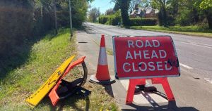 Signs littering major route removed after roadworks blunder
