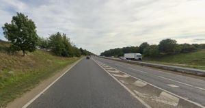 Part of A47 closed after crash between motorbike and lorry