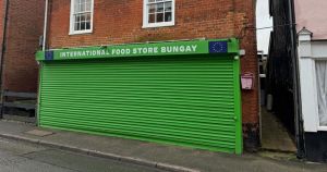 Shopkeeper locked in battle with council over 'alien' roller shutters