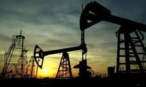 Oil spikes while stocks slip ahead of US Fed rate decision