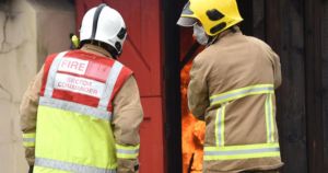 Firefighters tackled 150-tonne muck blaze that spread to trees