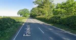 Road closed after crash between car and lorry