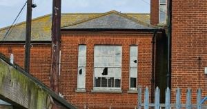 School warns of ‘extremely dangerous’ derelict hospital as children scale roof