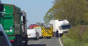 Woman dies in lorry crash on major road
