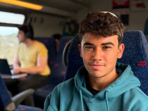 Riding the rails through a fractured land, young people reflect on real life, today
