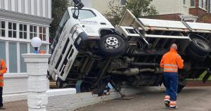 Lorry rolls on its side and destroys wall of Edwardian hotel