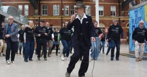 Why were people dancing the Charleston at the railway station today?