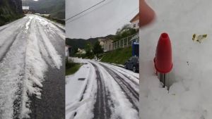 Un manto blanco cubriendo la carretera y hasta algún coche con cadenas (en pleno mes de mayo) en una tremenda granizada en la zona rural de Laviana: 