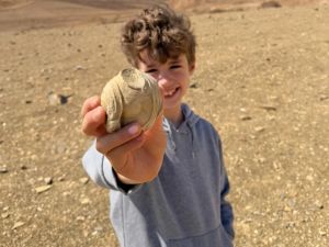 Eight-year-old boy finds 1,700-year-old statuette fragment while hiking in Negev