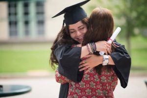 Entire graduating class shows up at their kindergarten teacher’s house for a surprise thanks