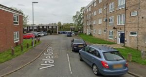 Police batter down door after woman found injured in street