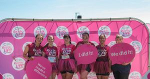 Care home staff tackle Pretty Muddy 5K to raise hundreds for cancer research