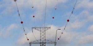 What are those orange balls on some power lines?