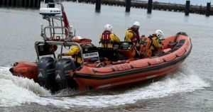 Two people and three cats get stranded as boat runs aground